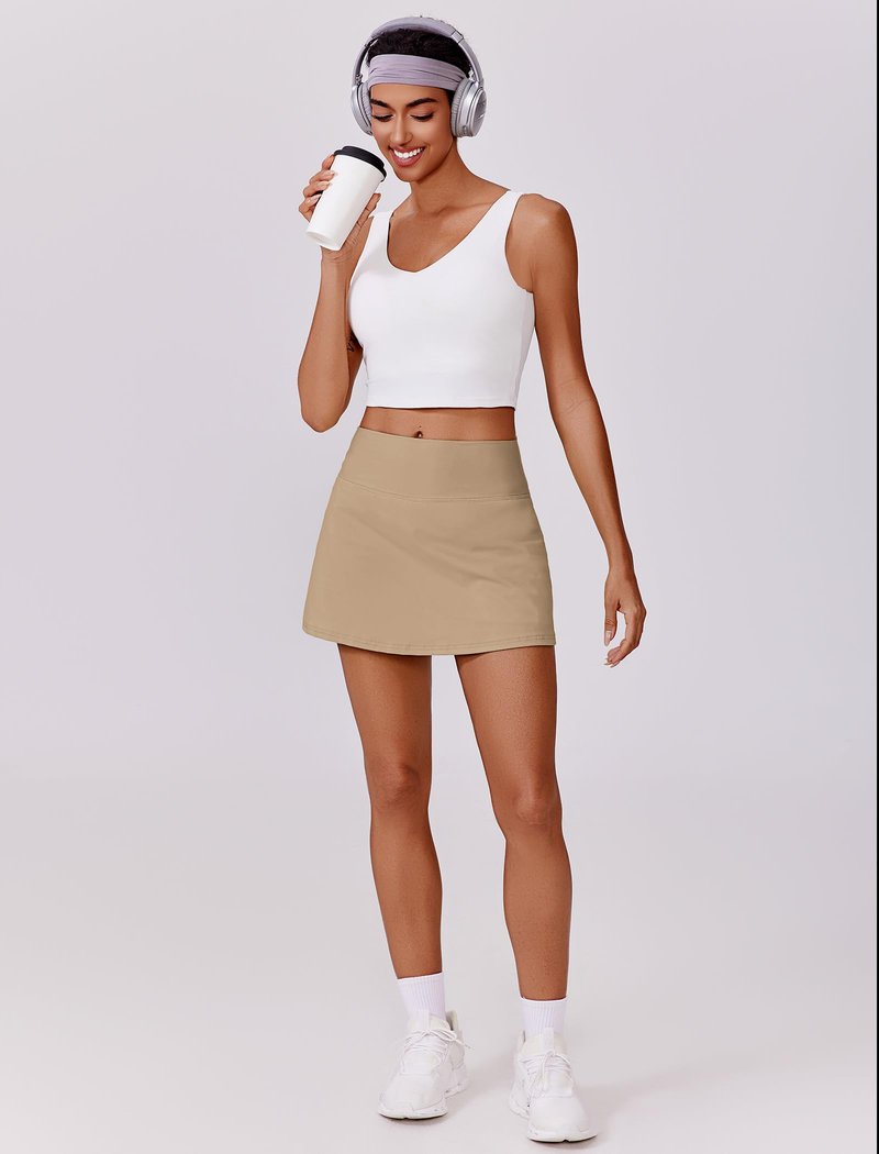 PINSPARK Tennis Skirts for Women V Waisted Golf Skorts Lightweight Athletic Skirt Stretchy Workout Skort with Pockets, Khaki Small