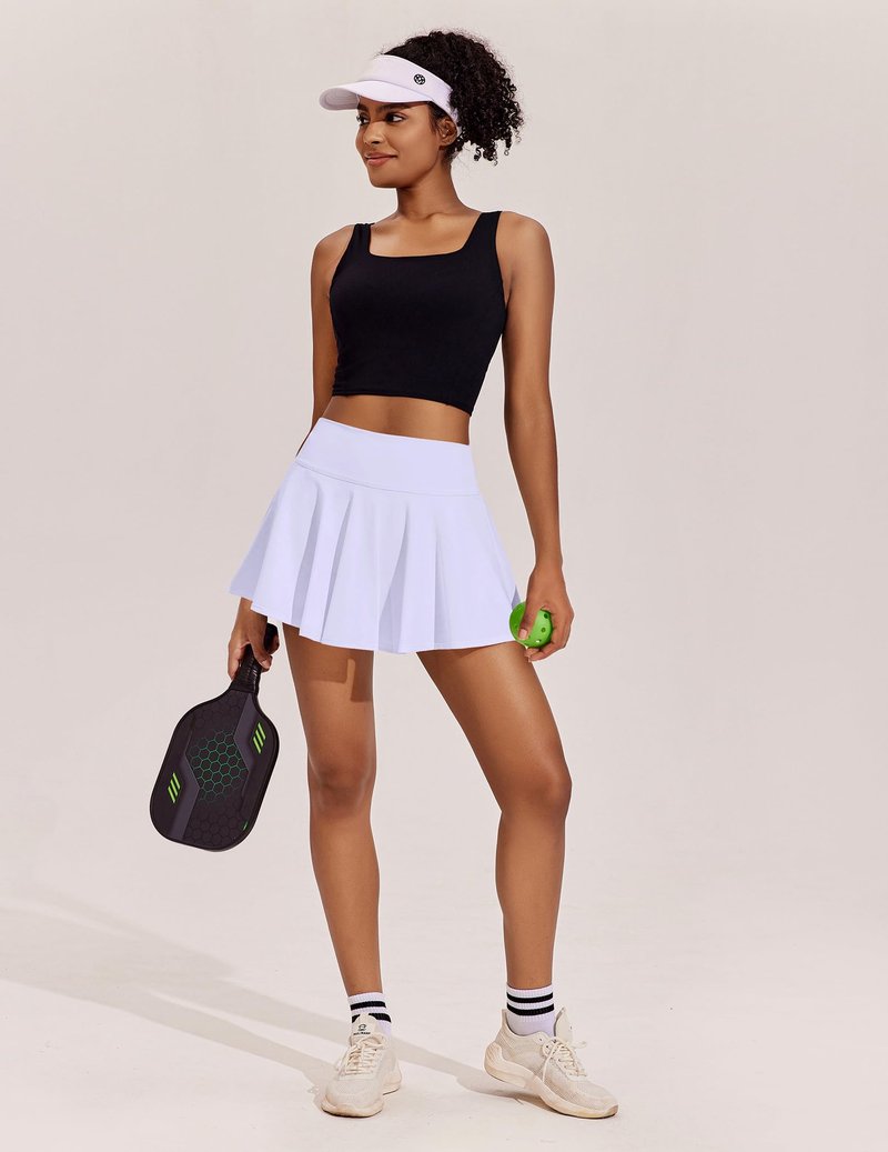 PINSPARK Women Golf Skort Tummy Control Cute Tennis Skort with Pockets Shorts A Line Sport Skirt, Peach Fuzz Medium