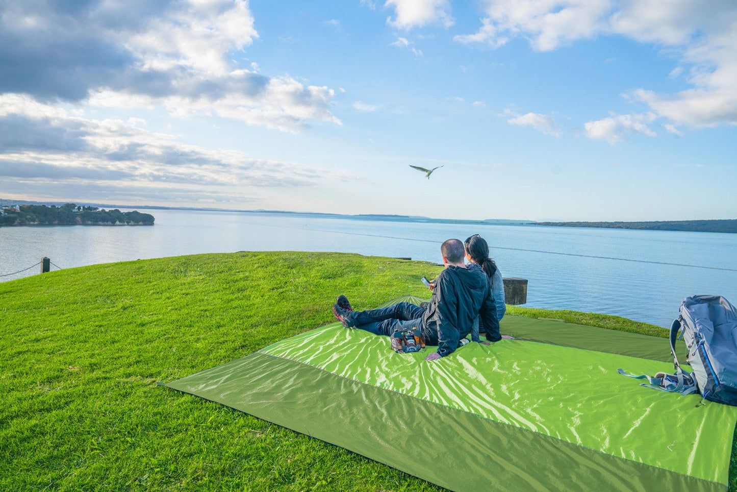 WEKAPO Beach Blanket - Sandproof Waterproof Extra Large Beach Mat | Oversized Sand-Free Lightweight Quick-Drying | Beach Vacation Essentials with Stakes & Corner Pockets (Turquoise, 7x7 FT)