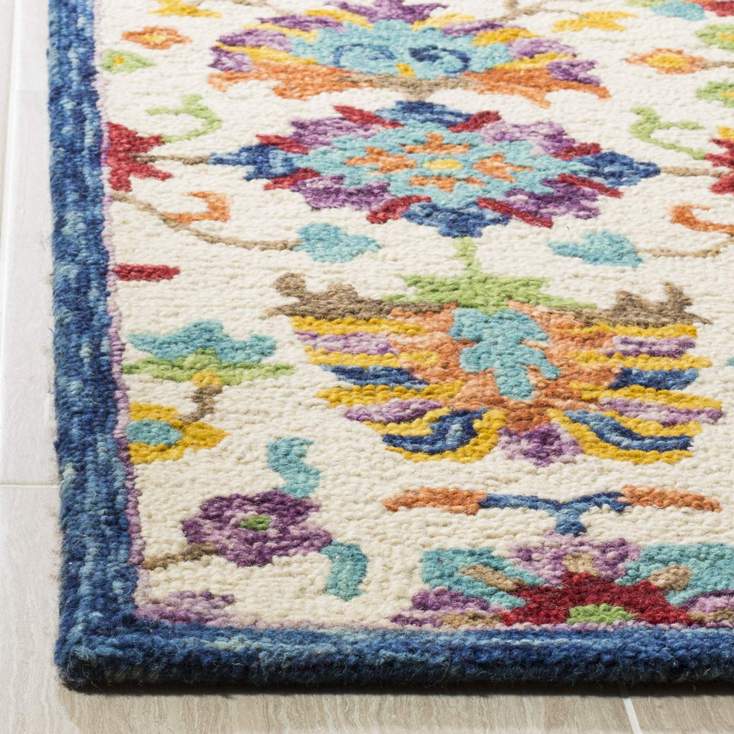 SAFAVIEH Aspen Collection Area Rug - 9' x 12', Ivory & Blue, Handmade Boho Floral Wool, Ideal for High Traffic Areas in Living Room, Bedroom (APN509A)