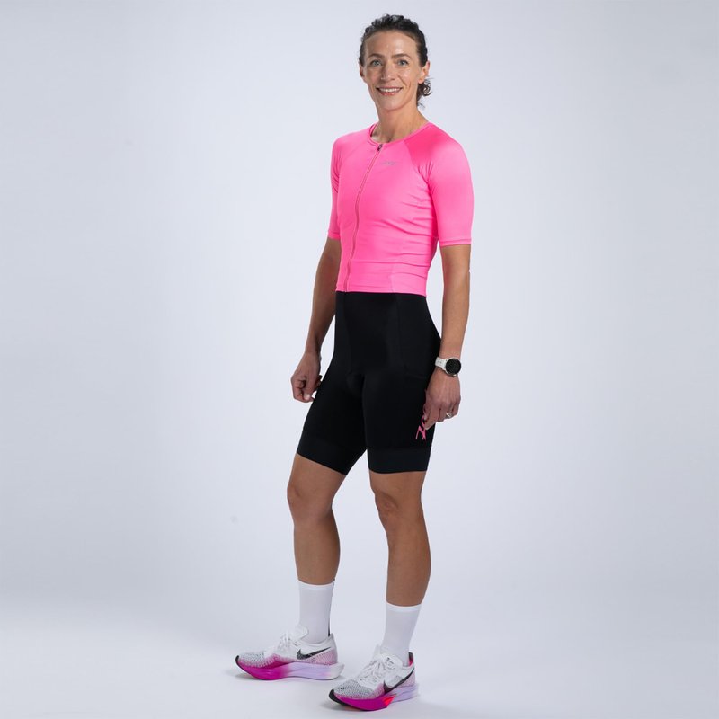 Zoot Women’s Core Tri Aero FZ Racesuit, Short Sleeve Moisture-Wicking Triathlon Suit, Plush Chamois & Race Day Storage - Bright Pink - Large