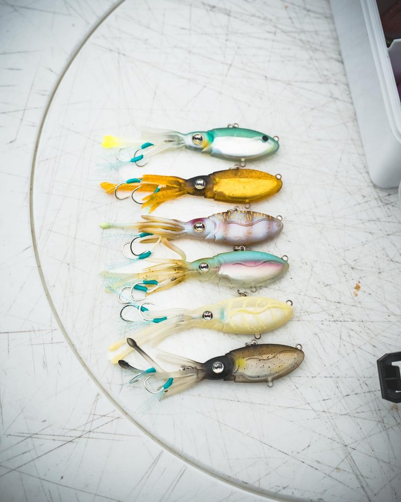Nomad Design Squidtrex Patented Vibrating Fishing Lure- Scent Added TPE Soft Plastic Lure for Saltwater w/Strong BKK Assist Hooks, Fishing Bait that Catches Many Species, 75mm 1/2oz- Green Gold Gizzy