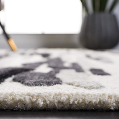 SAFAVIEH Rodeo Drive Collection Area Rug - 9' x 12', Ivory & Black, Handmade Mid-Century Modern Abstract Wool, Ideal for High Traffic Areas in Living Room, Bedroom (RD858Z)