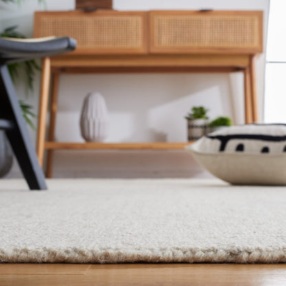 SAFAVIEH Micro-Loop Collection Area Rug - 9' x 12', Light Grey & Ivory, Handmade Wool, Ideal for High Traffic Areas in Living Room, Bedroom (MLP537F), Light Grey/Ivory