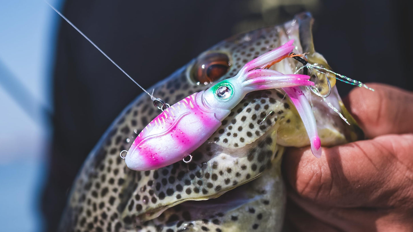 Nomad Design Squidtrex Patented Vibrating Fishing Lure- Scent Added TPE Soft Plastic Lure for Saltwater w/Strong BKK Assist Hooks, Fishing Bait that Catches Many Species, 75mm 1/2oz- Holo Ghost Shad