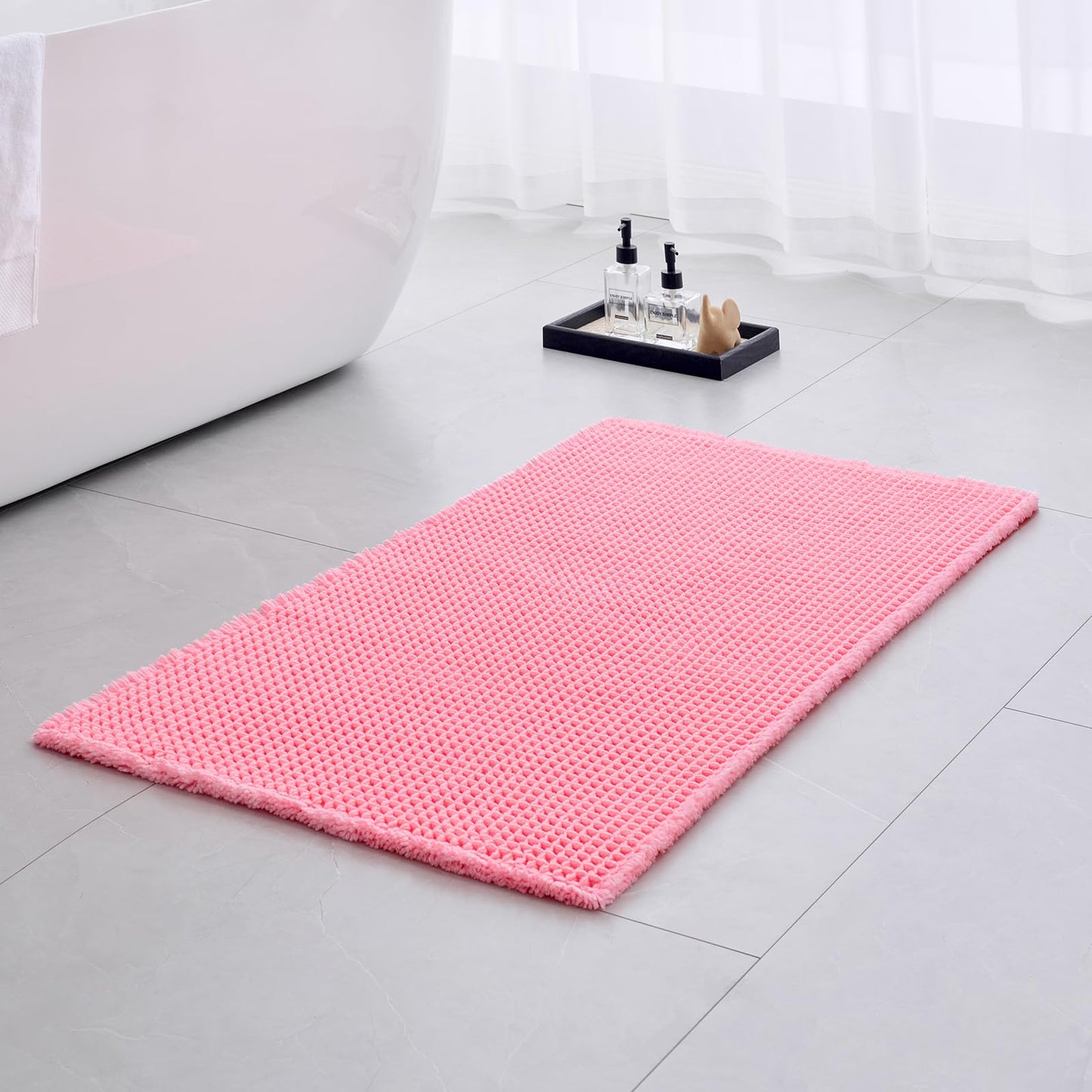 Ruggnovea Waffle Bath Mat Non Slip Washable 32x20, Super Absorbent Quick Dry Boho Bathroom Rugs with Tassels, High Density Non Slip Backing, Luxury Carpet for Tub&Shower, Pink