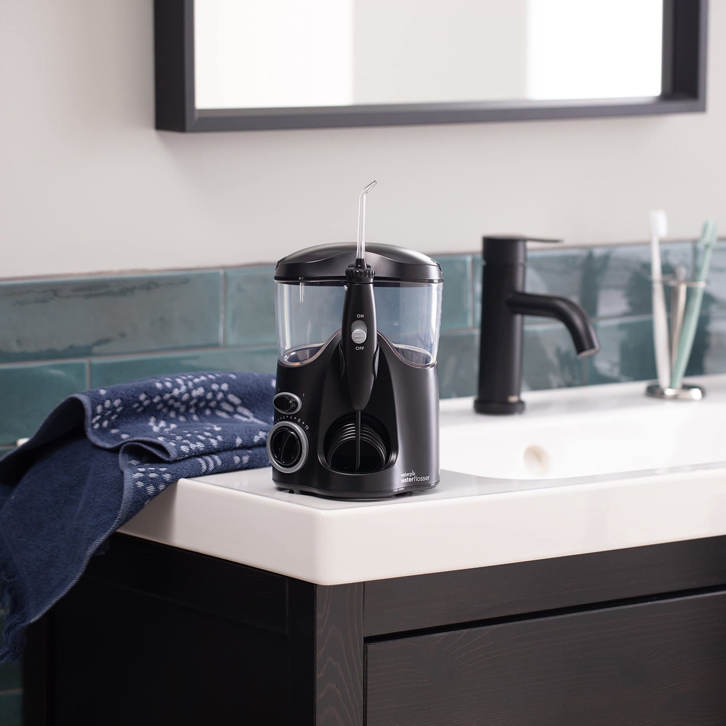 Waterpik Ultra Water Flosser, Black - 90+ Seconds of Flossing Time - 10 Pressure Settings, 360-Degree Tip Rotation - Includes Six Tips & Built-in Tip Storage