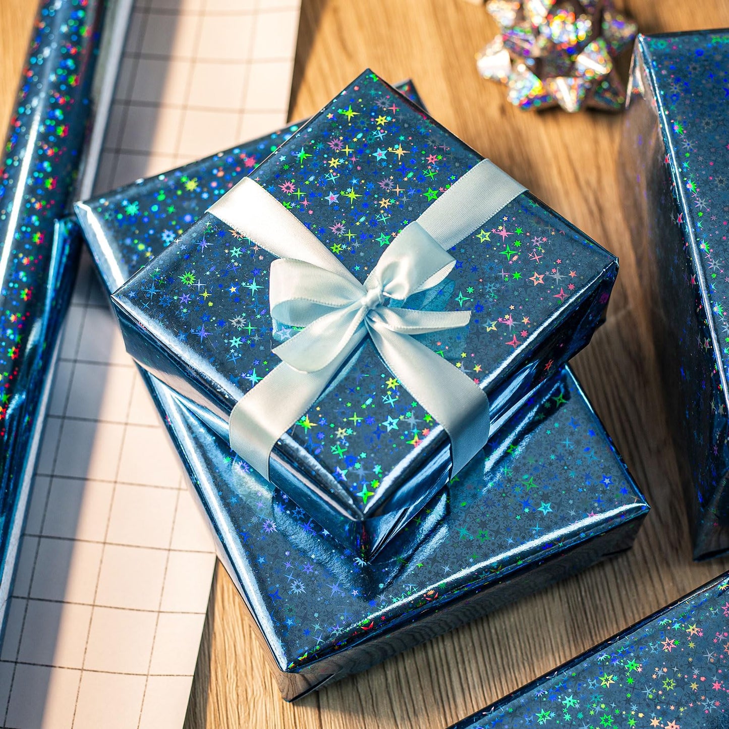 Merture Blue Holographic Wrapping Paper Roll, Blue Space Gift Wrap with Shining Galaxy Design for Birthday, Baby Shower, Christmas, Father's Day, Weeding - 17 In X 32.8 Ft (46.5 sq.ft.)