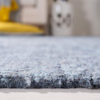 SAFAVIEH Abstract Collection Area Rug - 6' x 9', Blue, Handmade Wool, Ideal for High Traffic Areas in Living Room, Bedroom (ABT207A)