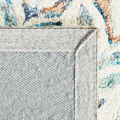 SAFAVIEH Capri Collection Area Rug - 2'3" x 11', Ivory & Blue, Handmade Wool, Ideal for High Traffic Areas in Living Room, Bedroom (CPR208A)