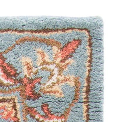 SAFAVIEH Heritage Collection Accent Rug - 4' x 6', Blue & Blue, Handmade Traditional Oriental Wool, Ideal for High Traffic Areas in Entryway, Living Room, Bedroom (HG969A)