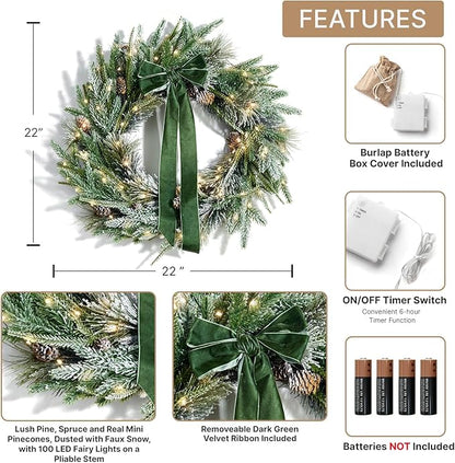 LampLust Cypress Christmas Wreath with Lights, 22 Inch Wreath with 100 Battery Operated LED Lights and Velvet Bow, Winter Wreaths for Front Door Christmas Decorations Holiday Decor