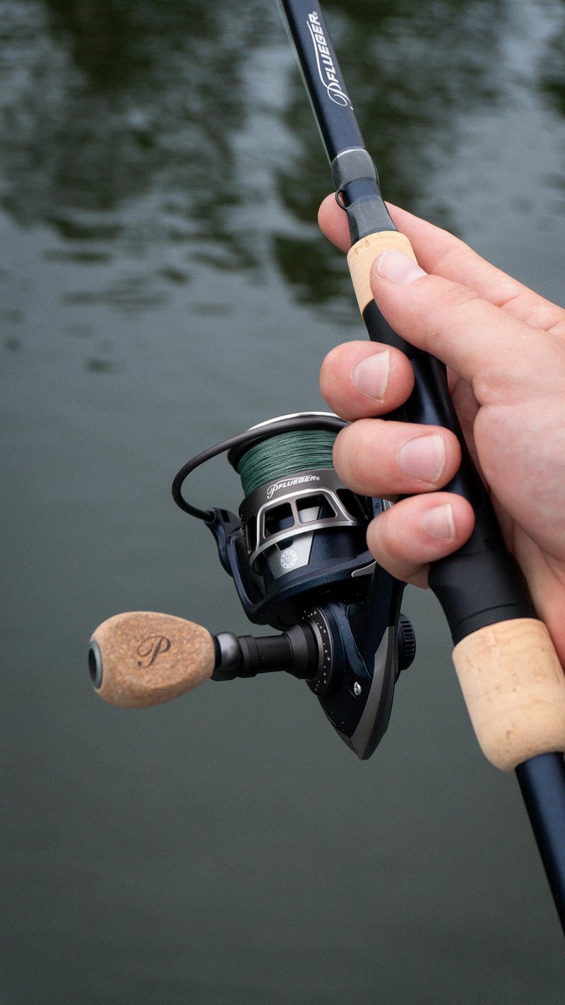 Pflueger 7' President XT Spinning Rod, Medium Light Power, 2-Piece Graphite Rod, Light and Sensitive Fishing Rod Ideal for Bass, Walleye, Panfish, Trout and Steelhead