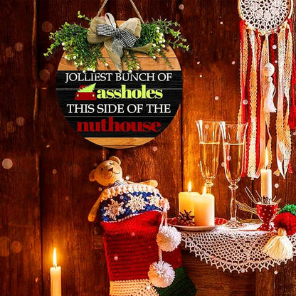 Christmas Door Sign Jolliest Bunch of A-holes Door Sign Funny This Side of The Nuthouse Round Wooden Sign with Bow Wreath Merry Christmas vacation Theme Door Hanging signs for Front Door