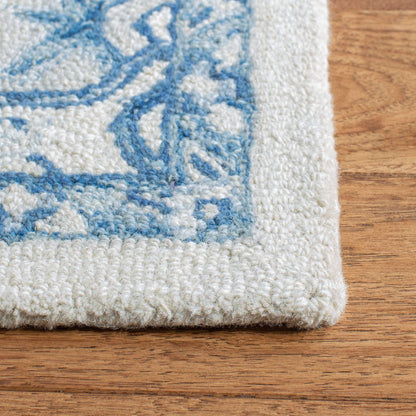 SAFAVIEH Area Rug 8x10 - Micro-Loop Collection - Large - Ivory & Blue, Handmade Wool, Shabby Chic Design, Ideal for Living Room, Bedroom, Office, Dining Space (MLP503G)