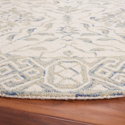 SAFAVIEH Dip Dye Collection Area Rug - 8' Round, Light Blue & Ivory, Handmade Wool, Ideal for High Traffic Areas in Living Room, Bedroom (DDY901L)
