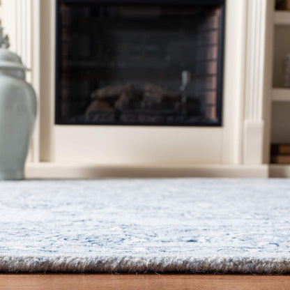 SAFAVIEH Micro-Loop Collection Accent Rug - 2'3" x 5', Light Blue & Ivory, Handmade Shabby Chic Wool, Ideal for High Traffic Areas in Entryway, Living Room, Bedroom (MLP504M)