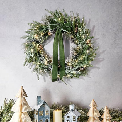 LampLust Cypress Christmas Wreath with Lights, 22 Inch Wreath with 100 Battery Operated LED Lights and Velvet Bow, Winter Wreaths for Front Door Christmas Decorations Holiday Decor