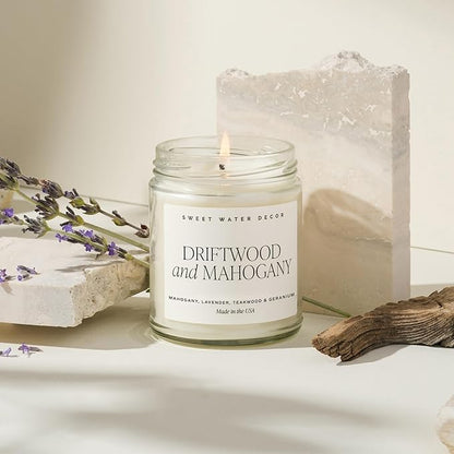 Sweet Water Decor Driftwood and Mahogany Soy Candle - Warm Mahogany, Fresh Lavender, Geranium, and Teakwood Scented Candles for Home - 9oz Clear Jar + Gold Lid, 40+ Hour Burn Time, Made in The USA