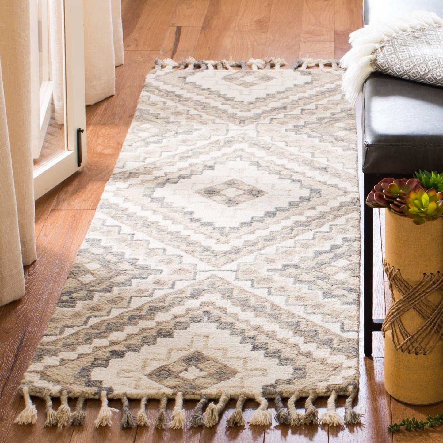 SAFAVIEH Aspen Collection Runner Rug - 2'3" x 7', Taupe & Ivory, Handmade Boho Braided Tassel Wool, Ideal for High Traffic Areas in Living Room, Bedroom (APN250E)