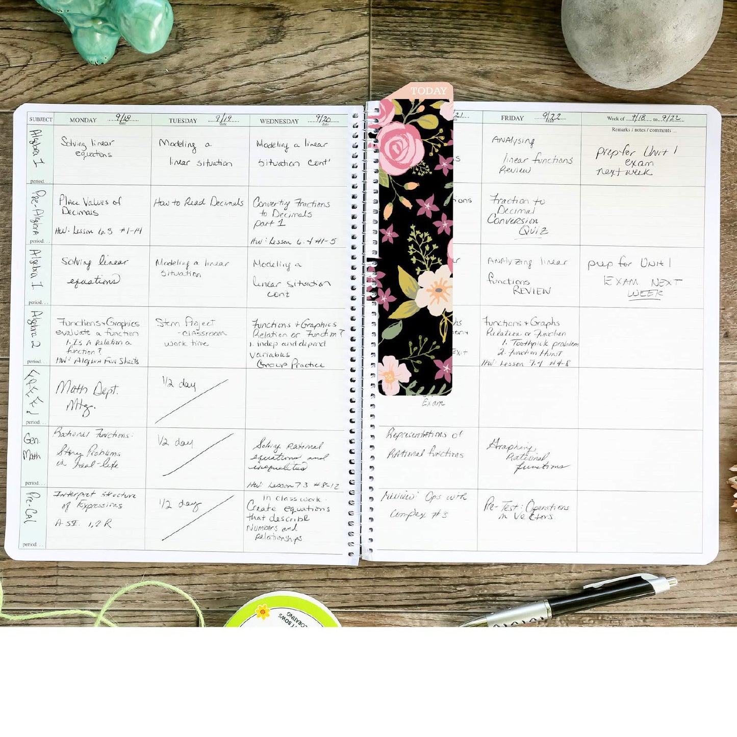 Elan Publishing Company HARDCOVER 7 Period Teacher Lesson Planner - Days Horizontally Across The Top with Bonus Clip-in Bookmark (Black Floral)