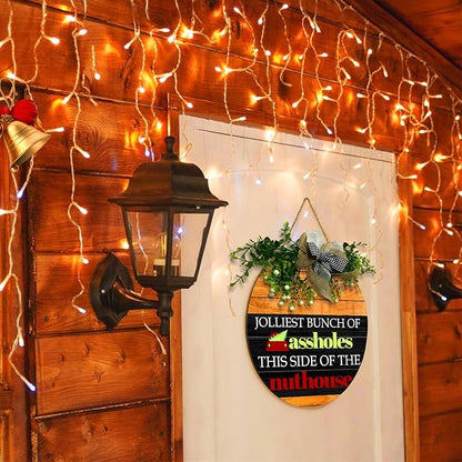 Christmas Door Sign Jolliest Bunch of A-holes Door Sign Funny This Side of The Nuthouse Round Wooden Sign with Bow Wreath Merry Christmas vacation Theme Door Hanging signs for Front Door