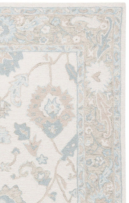 SAFAVIEH Ebony Collection Area Rug - 5' x 8', Ivory & Blue, Handmade Wool, Ideal for The Living Room, Bedroom, Dining Room (EBN136M-5)