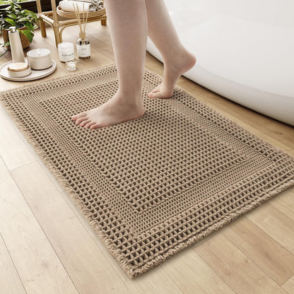 AMOAMI Waffle Bath-Mat, 24"x36" Super Absorbent Bath Mats for Bathroom Non Slip, Machine Washable Bathroom Rugs with Tassels Ultra Soft Boho Bath Rugs for Floor Beige