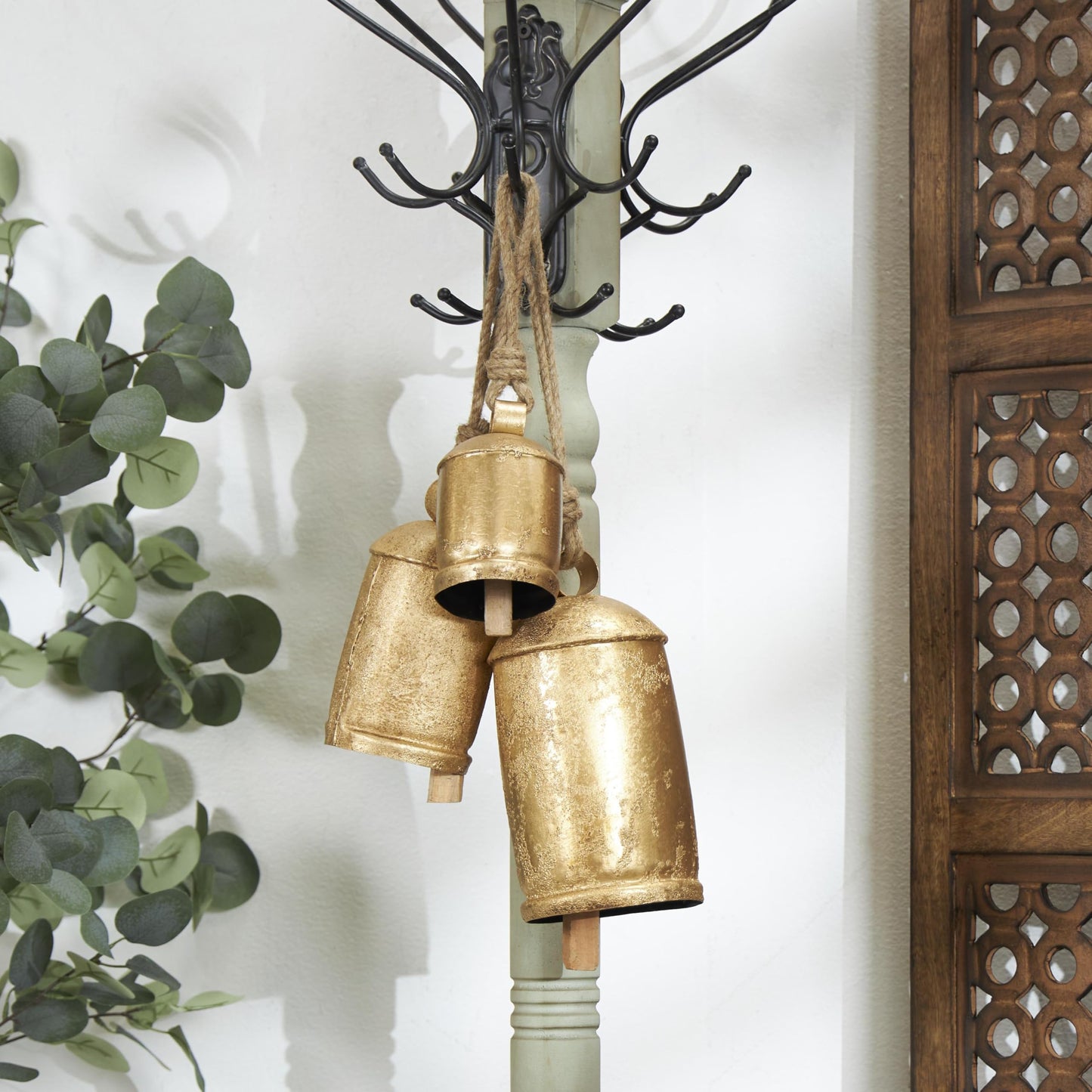 Deco 79 Metal Tibetan Inspired Decorative Cow Bells with Jute Hanging Rope, Set of 3 10", 7", 5"H, Gold