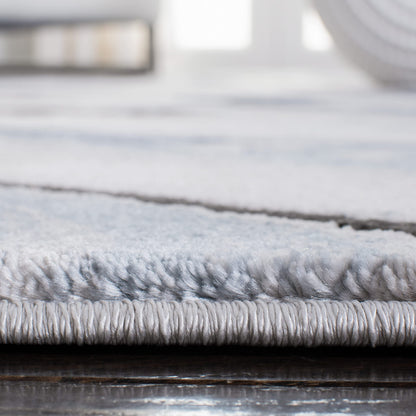 SAFAVIEH Craft Collection Area Rug - 6'7" x 9', Blue & Grey, Modern Abstract Design, Non-Shedding & Easy Care, Ideal for High Traffic Areas in Living Room, Bedroom (CFT819M)