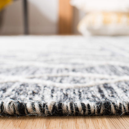 SAFAVIEH Kilim Collection Area Rug - 5' x 8', Black & Ivory, Handmade Moroccan Fringe Wool, Ideal for High Traffic Areas in Living Room, Bedroom (KLM521A)