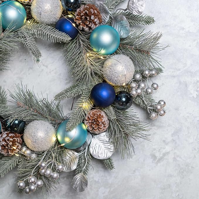 YULETIME 20-inch Christmas Wreath, Battery Operated Holiday Wreath with 20 Fairy Lights, Blue Baubles, Silvery Berries, Pine Cones, Silvery Leaves, Frosted Spruce Branches and Pine Needles (Blue)
