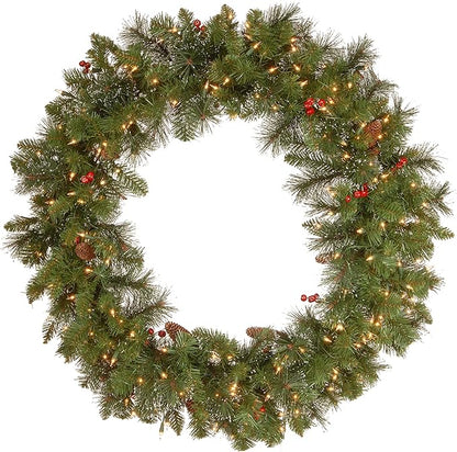 National Tree Company Pre-Lit Artificial Christmas Wreath, Green, Crestwood Spruce, White Lights, Decorated with Pine Cones, Berry Clusters, Frosted Branches, Christmas Collection, 36 Inches