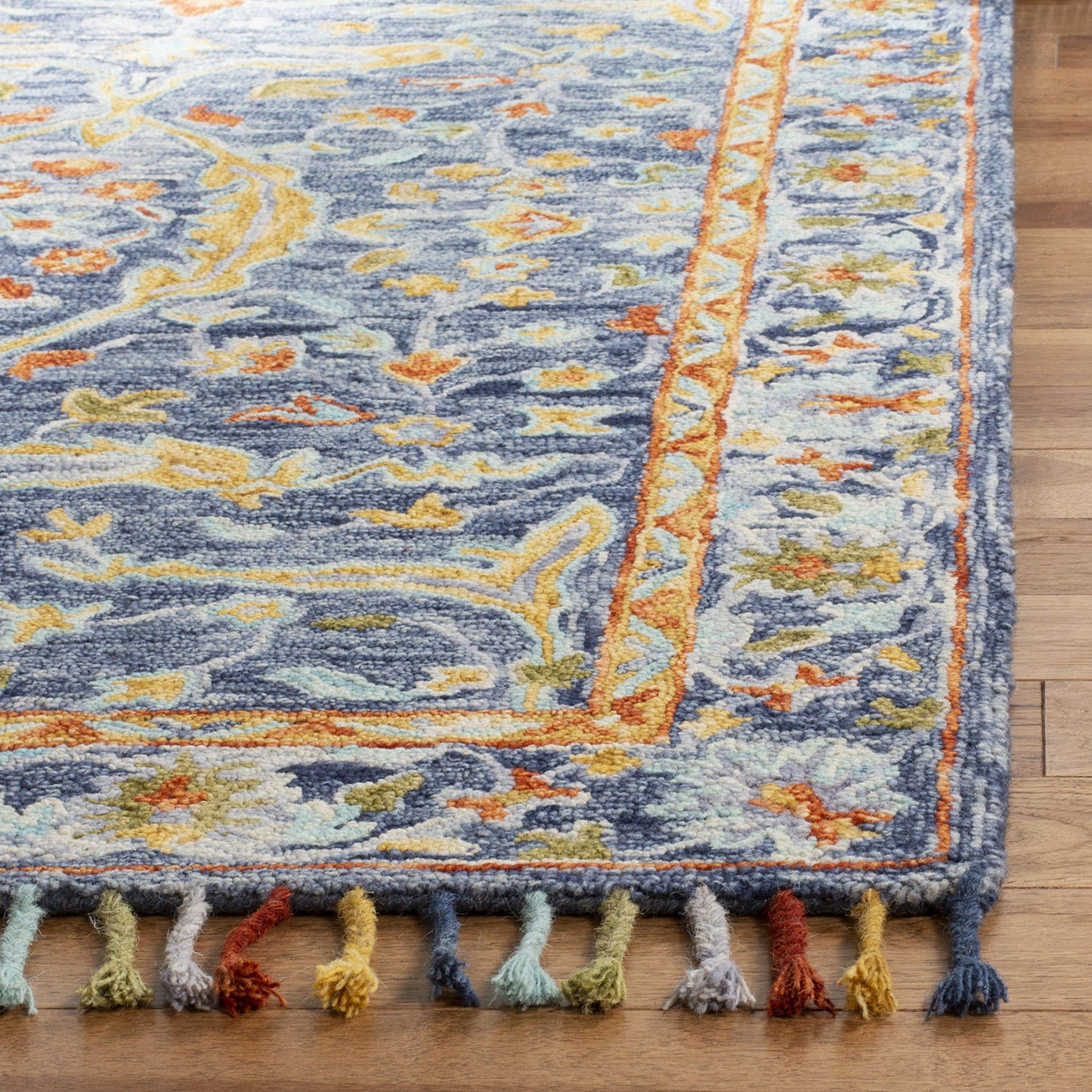 SAFAVIEH Aspen Collection Runner Rug - 2'3" x 7', Blue & Rust, Handmade Boho Braided Tassel Wool, Ideal for High Traffic Areas in Living Room, Bedroom (APN116M)