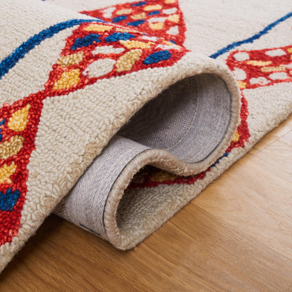 SAFAVIEH Aspen Collection Accent Rug - 2' x 3', Ivory & Multi, Handmade Moroccan Boho Tribal Wool, Ideal for High Traffic Areas in Entryway, Living Room, Bedroom (APN702A)