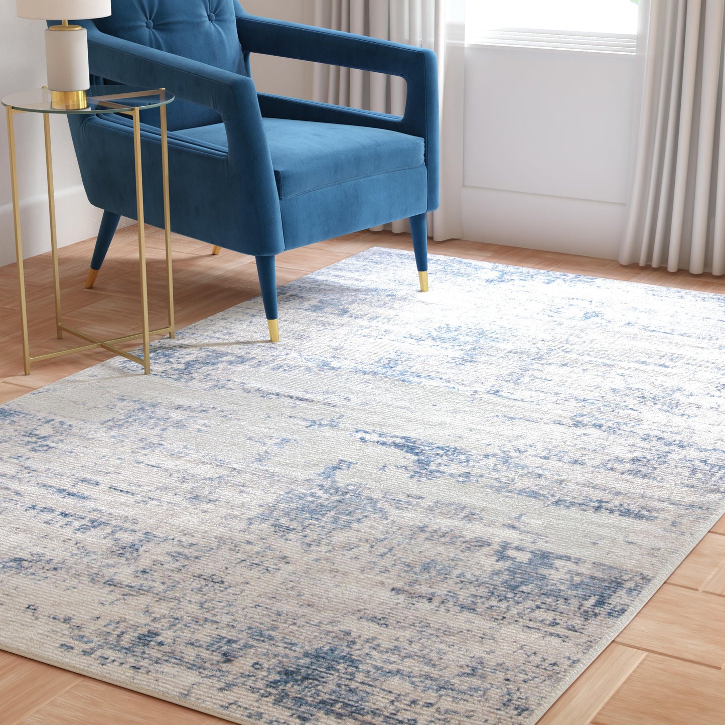 SAFAVIEH Amelia Collection Area Rug - 6' x 9', Ivory & Blue, Modern Abstract Design, Non-Shedding & Easy Care, Ideal for High Traffic Areas in Living Room, Bedroom (ALA700A)