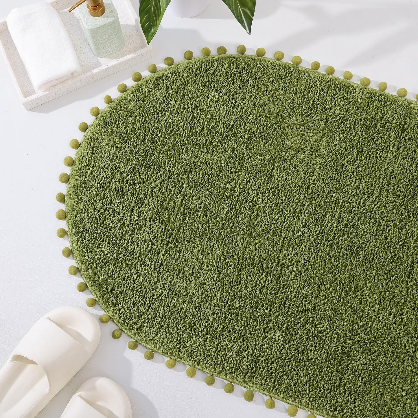 YIRDDEO Bath Mat Olive Green Oval Rug with Pom Bathroom Rugs for Bedroom Non Slip Cute Boho Absorbent Mats Soft Plush Washable Rug (24x36 inches)