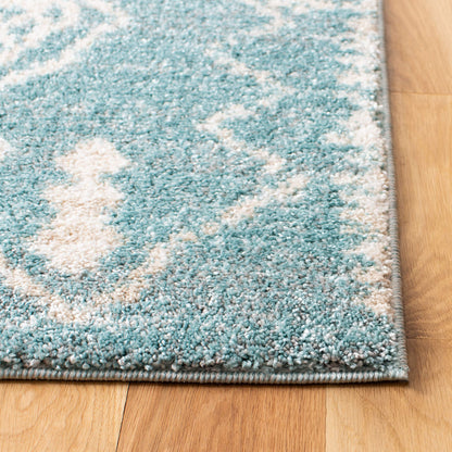 SAFAVIEH Tunisia Collection Area Rug - 5'3" x 7'7", Aqua & Ivory, Moroccan Tribal Design, Non-Shedding & Easy Care, Ideal for High Traffic Areas in Living Room, Bedroom (TUN736J)