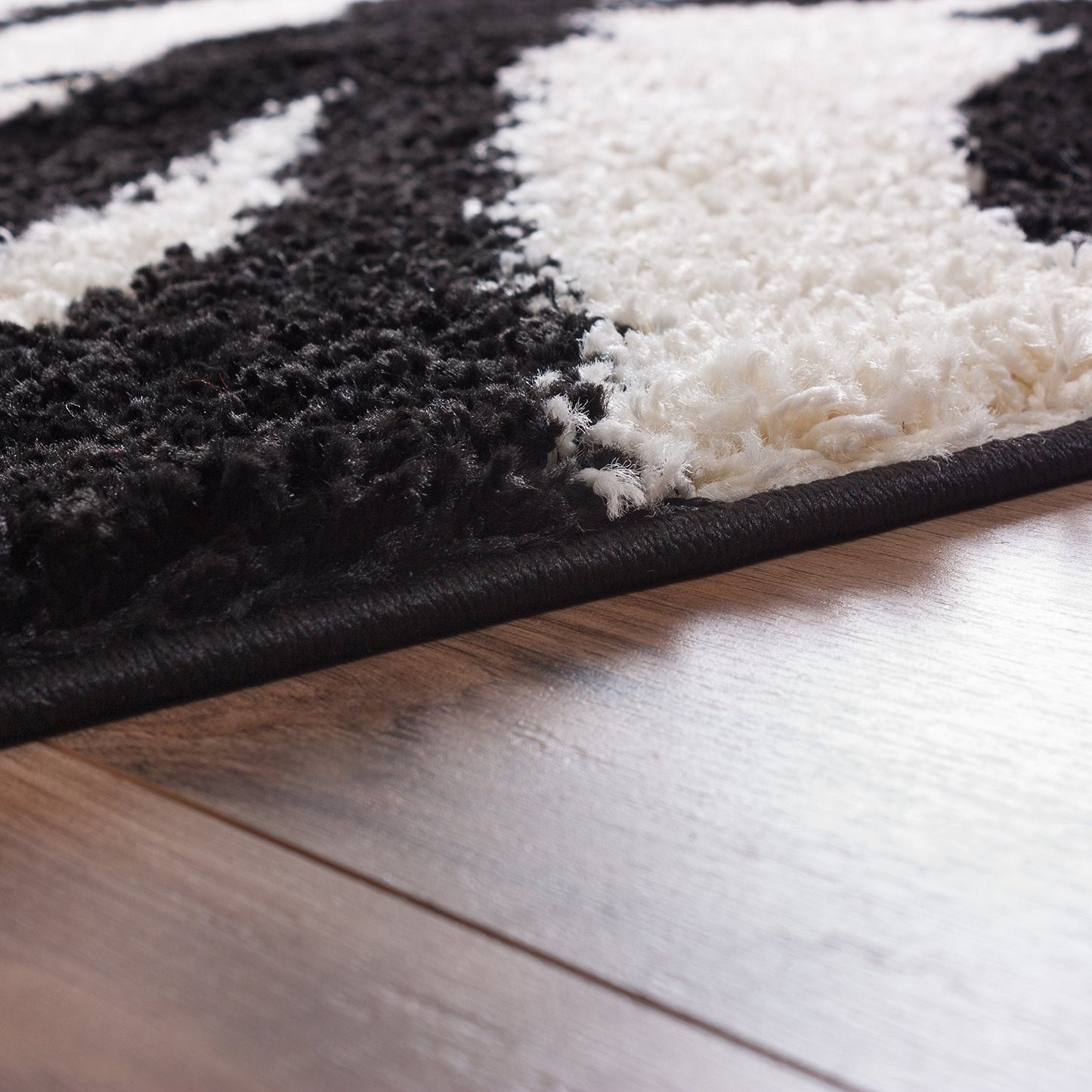 ruglots Modern Animal Print Area Rug Shag Zebra Black & Ivory Plush Easy Care Thick Soft Plush Living Room,3 ft 3 in x 5 ft 3 in