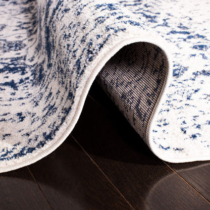 SAFAVIEH Madison Collection Area Rug - 10' Square, Cream & Navy, Snowflake Medallion Distressed Design, Non-Shedding & Easy Care, Ideal for High Traffic Areas in Living Room, Bedroom (MAD603D)