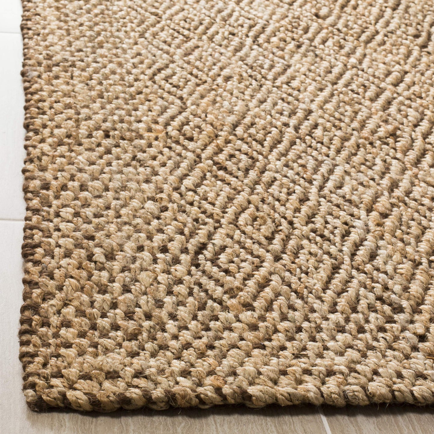 SAFAVIEH Natural Fiber Collection Accent Rug - 2'3" x 4', Natural & Brown, Handmade Boho Farmhouse Fringe Jute, Ideal for High Traffic Areas in Entryway, Living Room, Bedroom (NF183A)