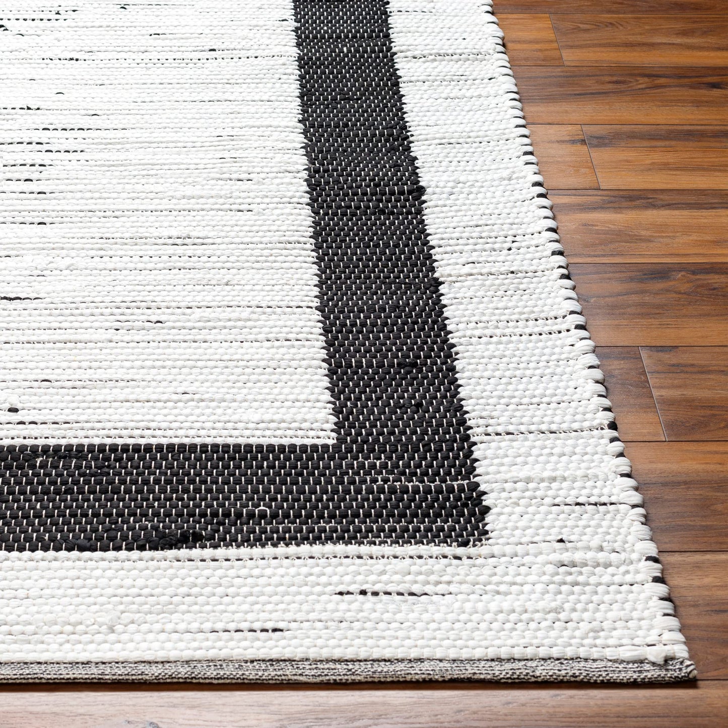 Livabliss Jean Modern Minimalist Area Rug,27" x 45", White/Black