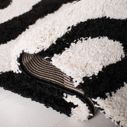 SAFAVIEH Florida Shag Collection Area Rug - 5'3" x 7'6", Ivory & Black, Zebra Print Design, Non-Shedding & Easy Care, 1.2-inch Thick Ideal for High Traffic Areas in Living Room, Bedroom (SG452-1290)