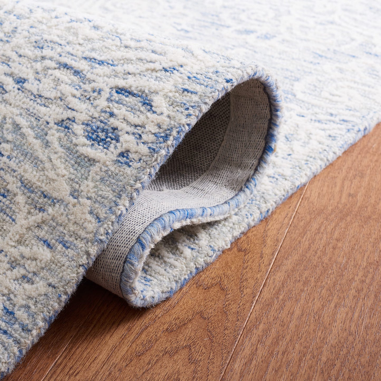 SAFAVIEH Metro Collection Accent Rug - 4' x 6', Blue & Ivory, Handmade Floral Wool, Ideal for High Traffic Areas in Entryway, Living Room, Bedroom (MET885M)