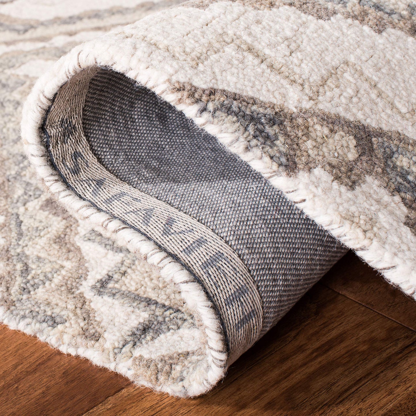 SAFAVIEH Aspen Collection Runner Rug - 2'3" x 7', Taupe & Ivory, Handmade Boho Braided Tassel Wool, Ideal for High Traffic Areas in Living Room, Bedroom (APN250E)