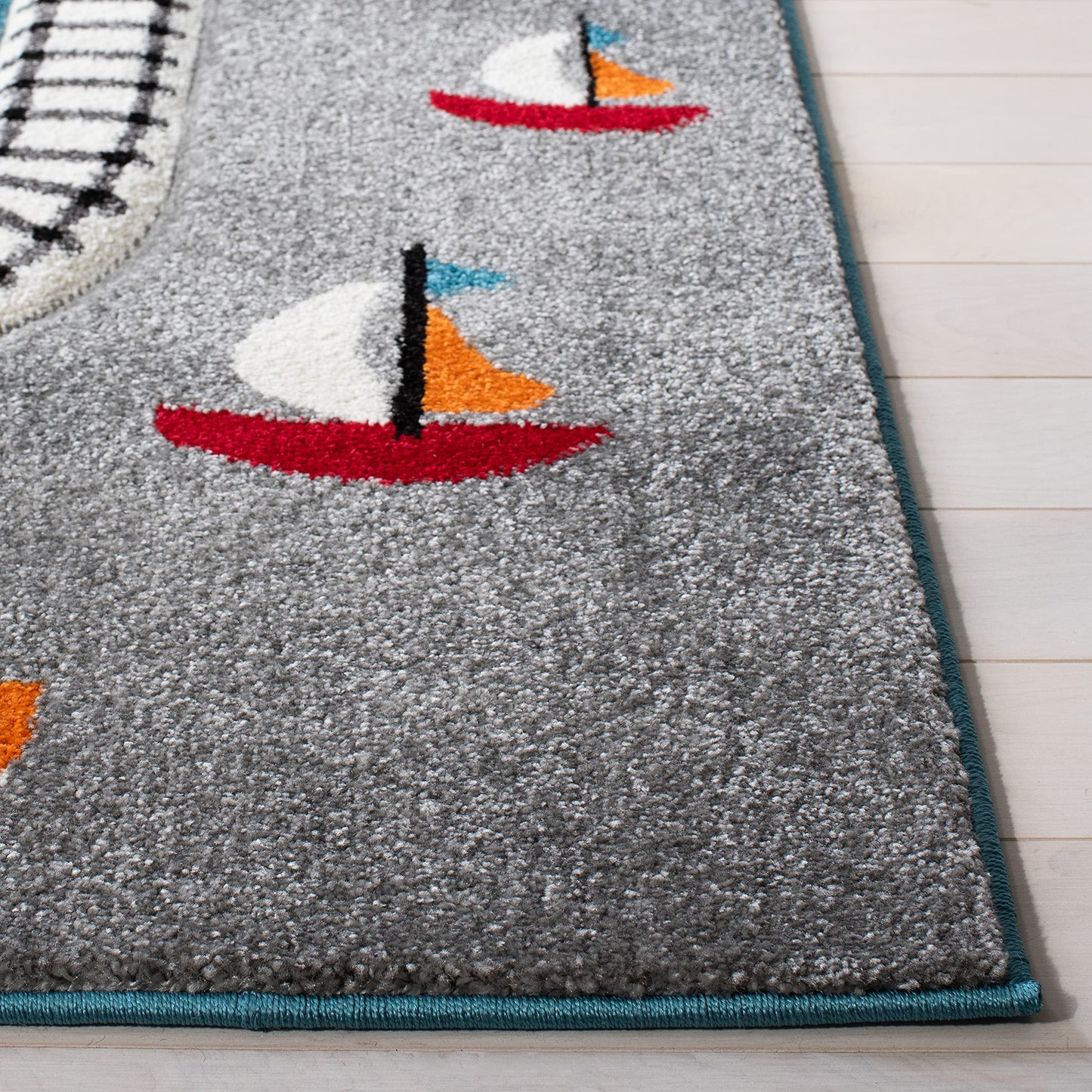 SAFAVIEH Carousel Kids Collection Area Rug - 5'3" x 7'6", Turquoise & Ivory, Non-Shedding & Easy Care, Ideal for High Traffic Areas for Boys & Girls in Playroom, Nursery, Bedroom (CRK192K)