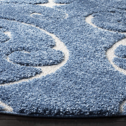 SAFAVIEH Area Rug 9x12 - Florida Shag Collection - Large - Light Blue & Cream, Scroll Design, Non-Shedding & Easy to Clean, High-Low Plush Pile, Ideal for Living Room, Bedroom, Dining (SG455-6011)