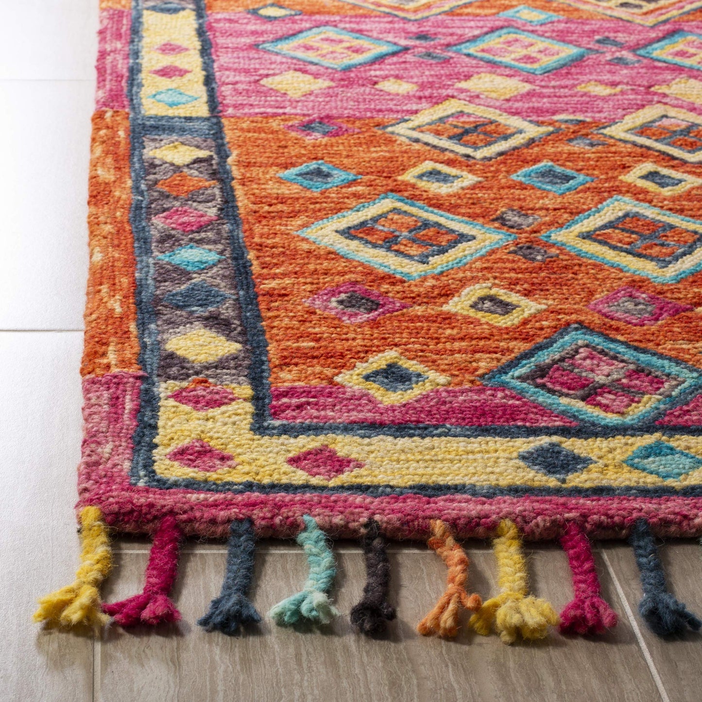 SAFAVIEH Aspen Collection Accent Rug - 3' x 5', Orange & Fuchsia, Handmade Boho Braided Tassel Wool, Ideal for High Traffic Areas in Entryway, Living Room, Bedroom (APN138A)