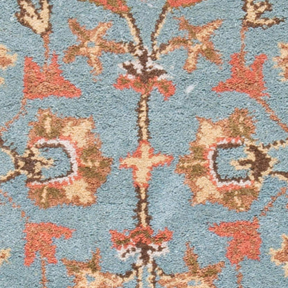 SAFAVIEH Heritage Collection Accent Rug - 4' x 6', Blue & Blue, Handmade Traditional Oriental Wool, Ideal for High Traffic Areas in Entryway, Living Room, Bedroom (HG969A)