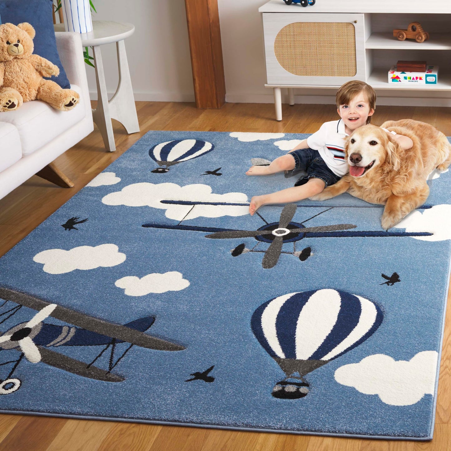 SAFAVIEH Carousel Kids Collection Area Rug - 5'3" x 7'6", Blue & Ivory, Non-Shedding & Easy Care, Ideal for High Traffic Areas for Boys & Girls in Playroom, Nursery, Bedroom (CRK137M-5)